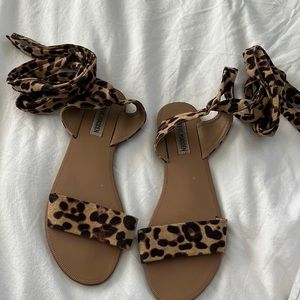 Used, Steve Madden cheetah sandals that wrap around your ankle.